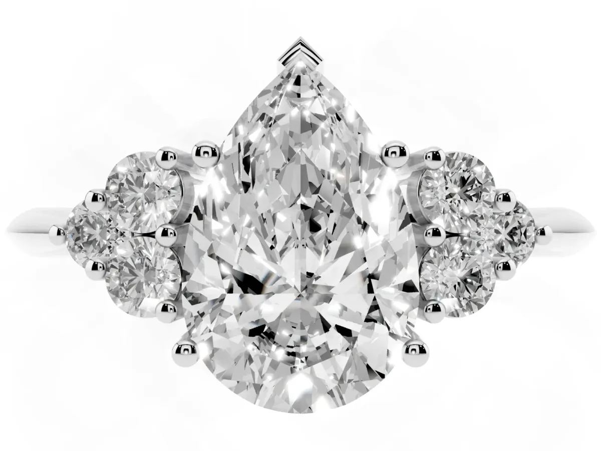 Pear Cut Cut Diamond Cluster Ring with Solitaire Band and Four-Prong Setting Silver