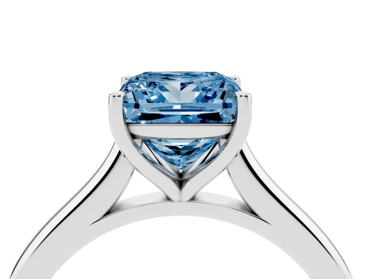Fancy Blue Princess Cut Cut Solitaire Ring with Cathedral Band and Four-Prong Setting Silver