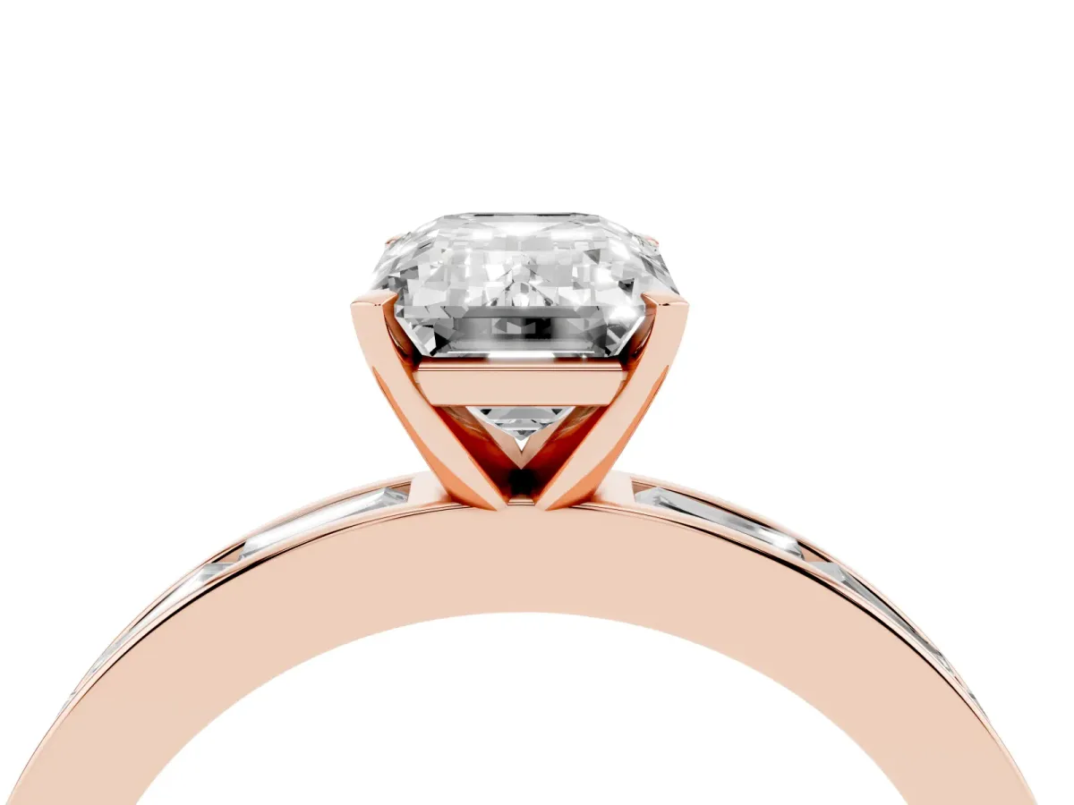 Emerald Cut Solitaire Diamond Ring with Channel-Set Baguette Band and Four-Prong Setting Rose gold