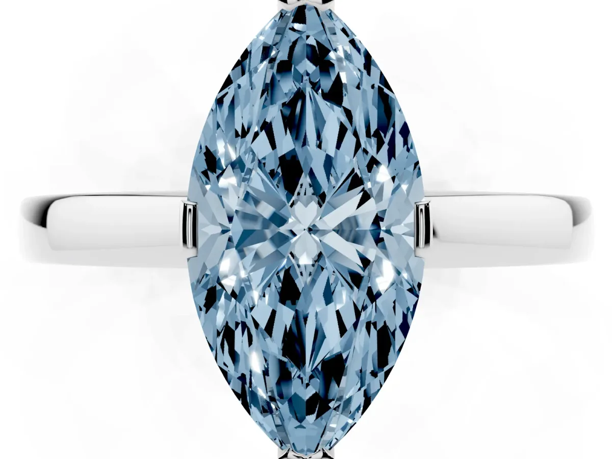 Fancy Blue Marquise Cut Cut Solitaire Ring with Four-Prong Setting and Classic Band Silver