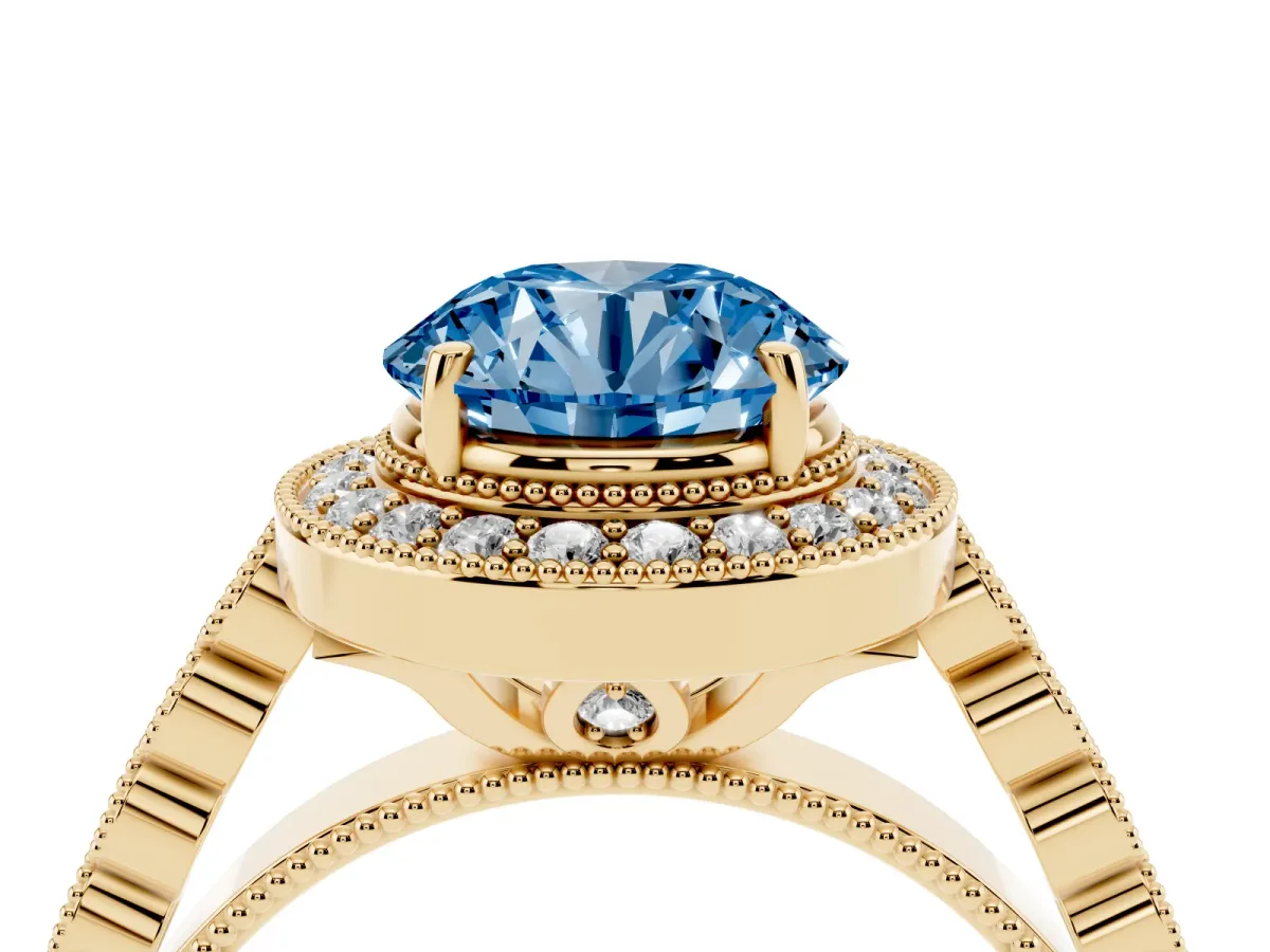 Fancy Blue Round Cut Halo Milgrain Solitaire with Bezel Set Side Stones and Pave Band Yellow gold