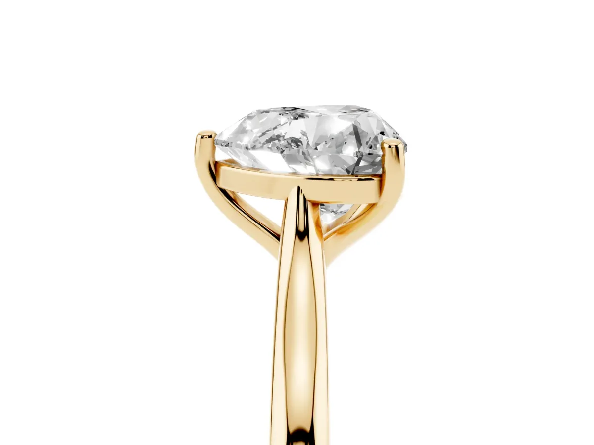 Heart Cut Cut Solitaire Ring with Cathedral Band and Four-Prong Setting Yellow gold