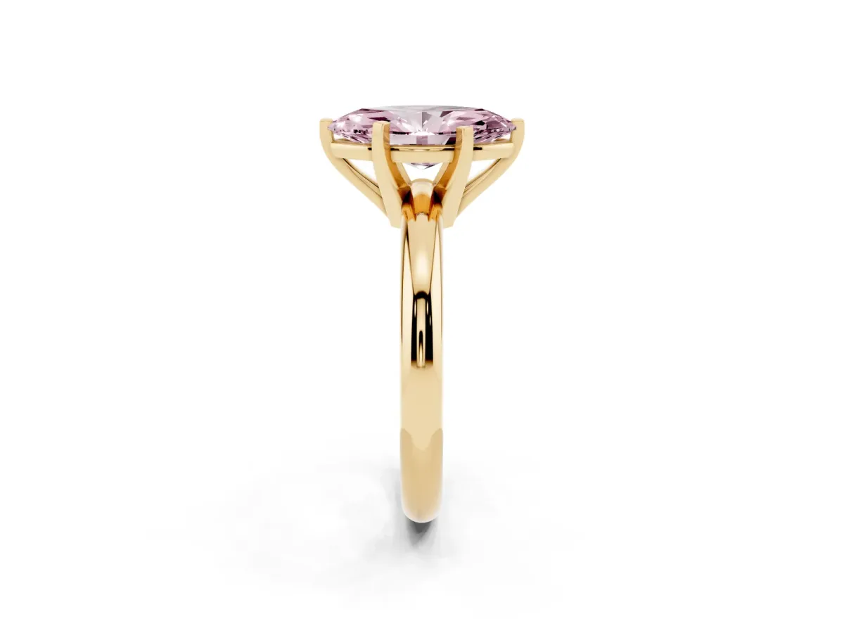 Fancy Pink Marquise Cut Diamond Solitaire Engagement Ring with Round Band and Four-Prong Setting Yellow gold