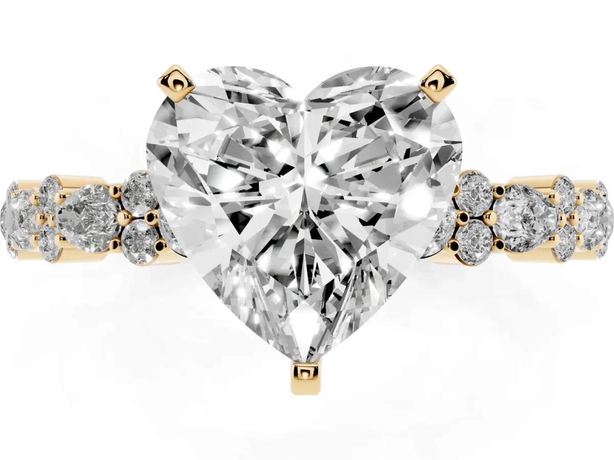 Heart Cut Diamond Side Stone Solitaire Ring with Round and Four-Prong Setting Yellow gold