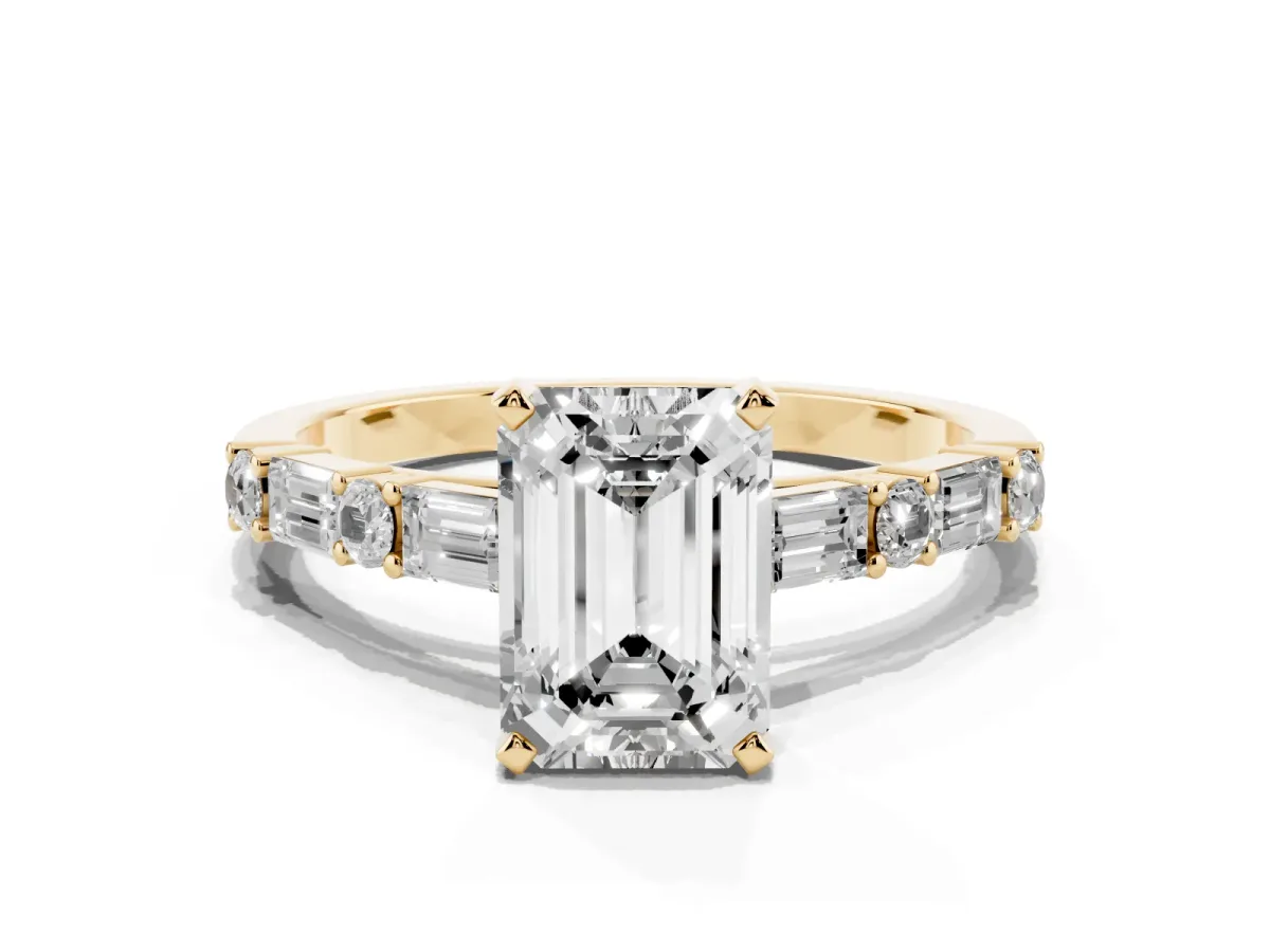 Emerald Cut Diamond Solitaire with Side Baguettes and Channel Set Band Yellow gold