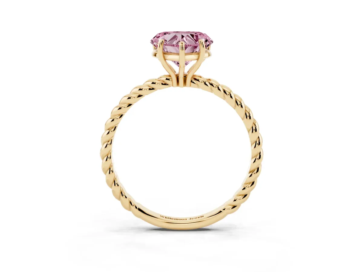 Fancy Pink Heart Cut Solitaire Twist Band Ring with Four-Prong Setting Yellow gold