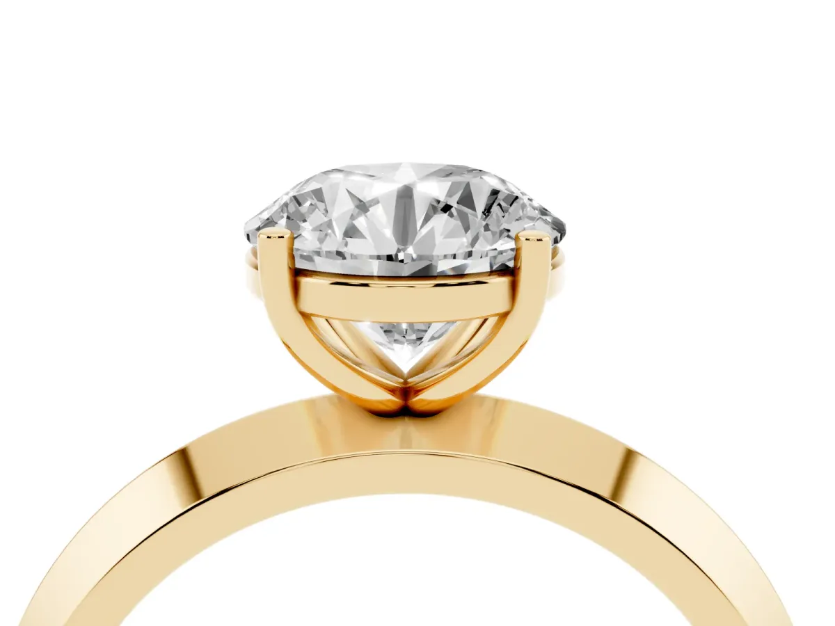 Round Cut Cut Solitaire Engagement Ring with Flat Band and Four-Prong Setting Yellow gold