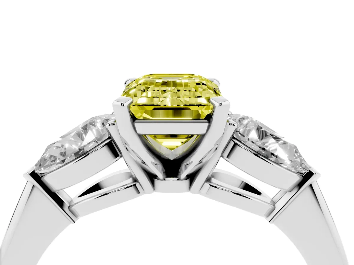 Fancy Yellow Three-Stone Emerald Cut Diamond Ring with Pear Side Stones and Four-Prong Setting Silver
