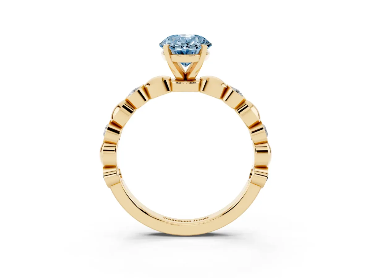 Fancy Blue Oval Cut Solitaire Bezel-Set Diamond Ring with Beaded Band and Four-Prong Setting Yellow gold