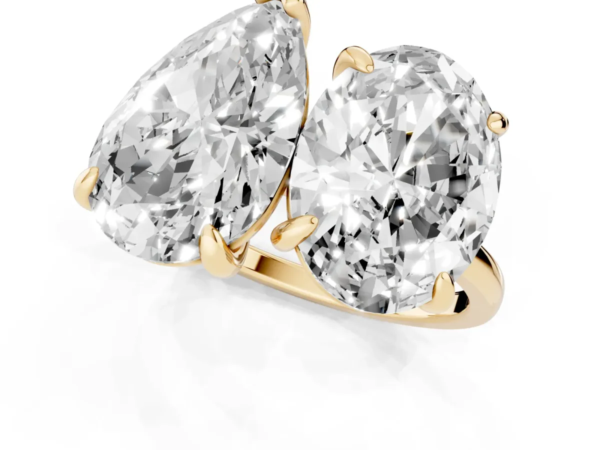 Oval and Pear Toi Moi Ring with Prong Setting and Plain Band Yellow gold
