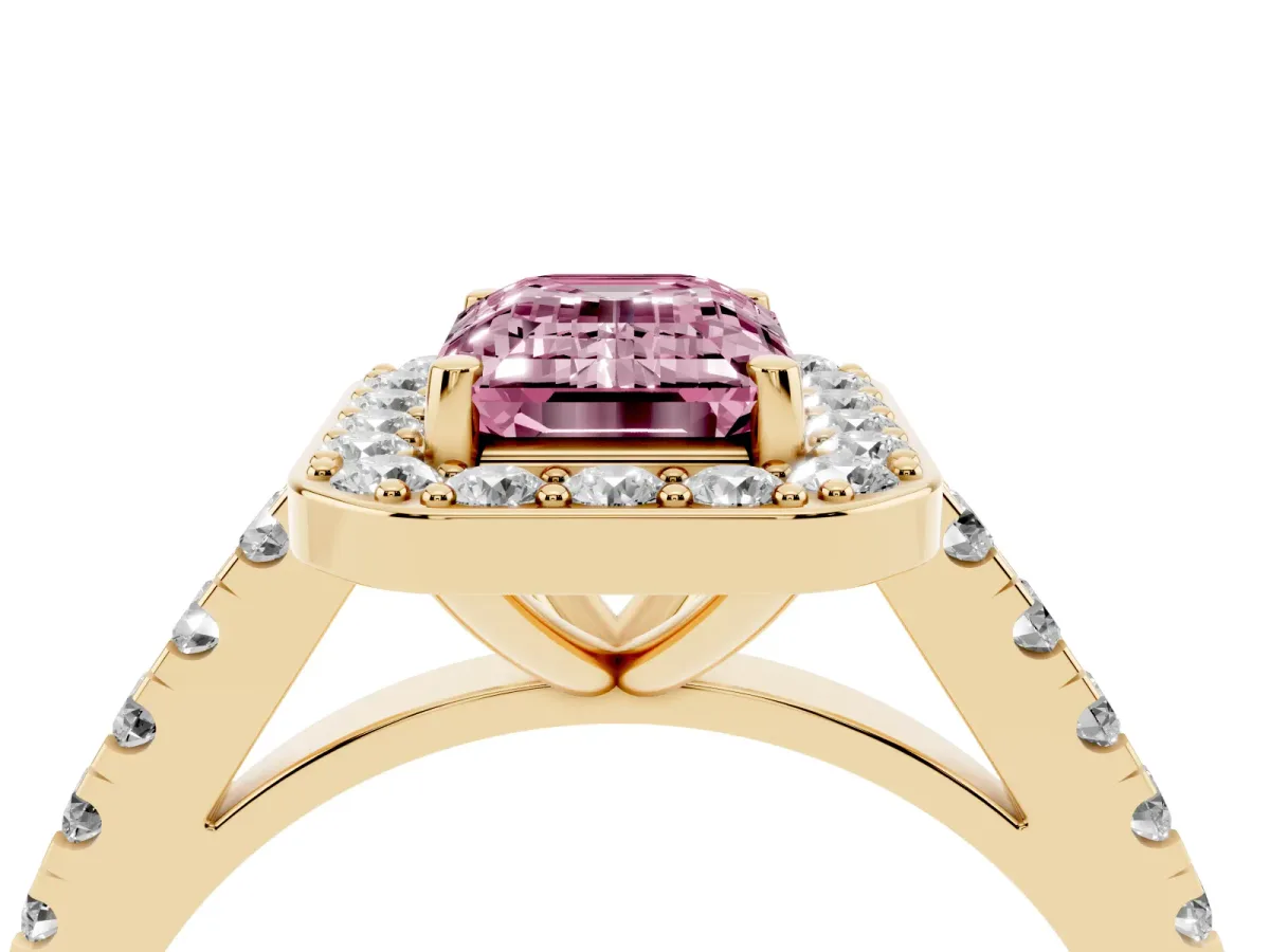 Fancy Pink Emerald Cut Diamond Halo Ring with Round Pavé Split Shank and Prong Setting Yellow gold