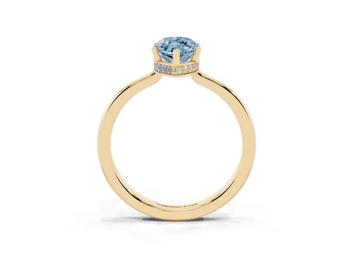 Fancy Blue Marquise Cut Cut Solitaire Engagement Ring with Four-Prong Setting on a Classic Band Yellow gold