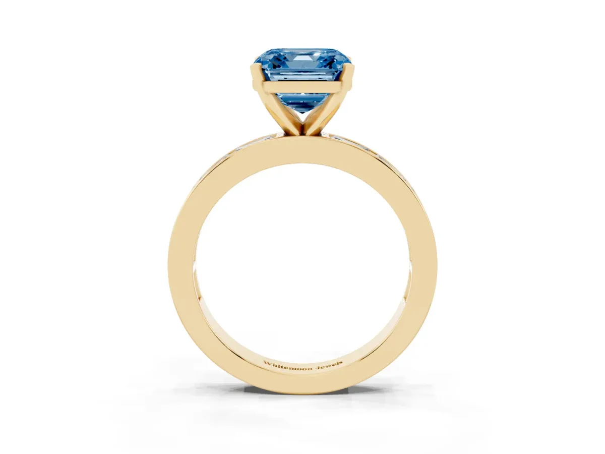 Fancy Blue Asscher Cut Solitaire Diamond Ring with Channel-Set Baguette Band and Four-Prong Setting Yellow gold