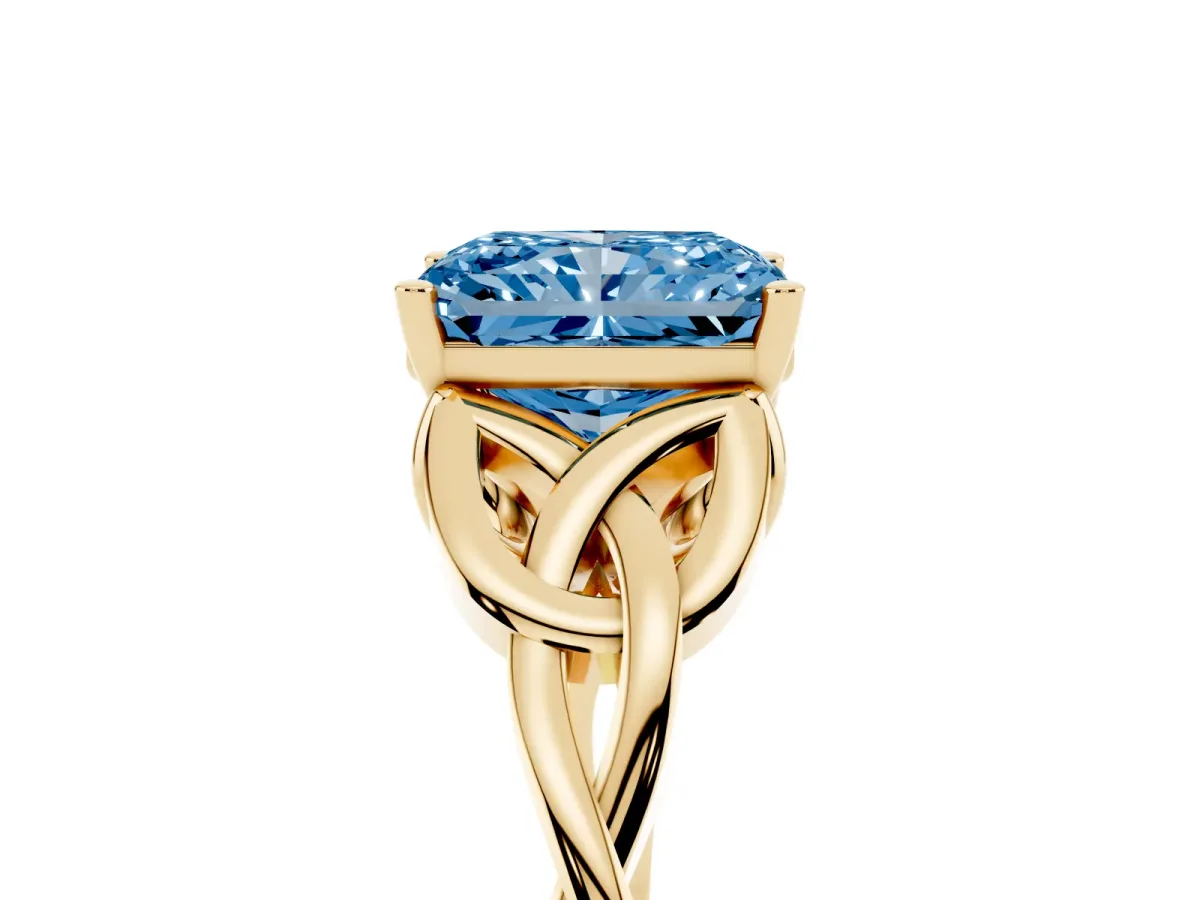 Fancy Blue Radiant Cut Diamond Solitaire Engagement Ring with Celtic Knot Band and Four-Prong Setting Yellow gold