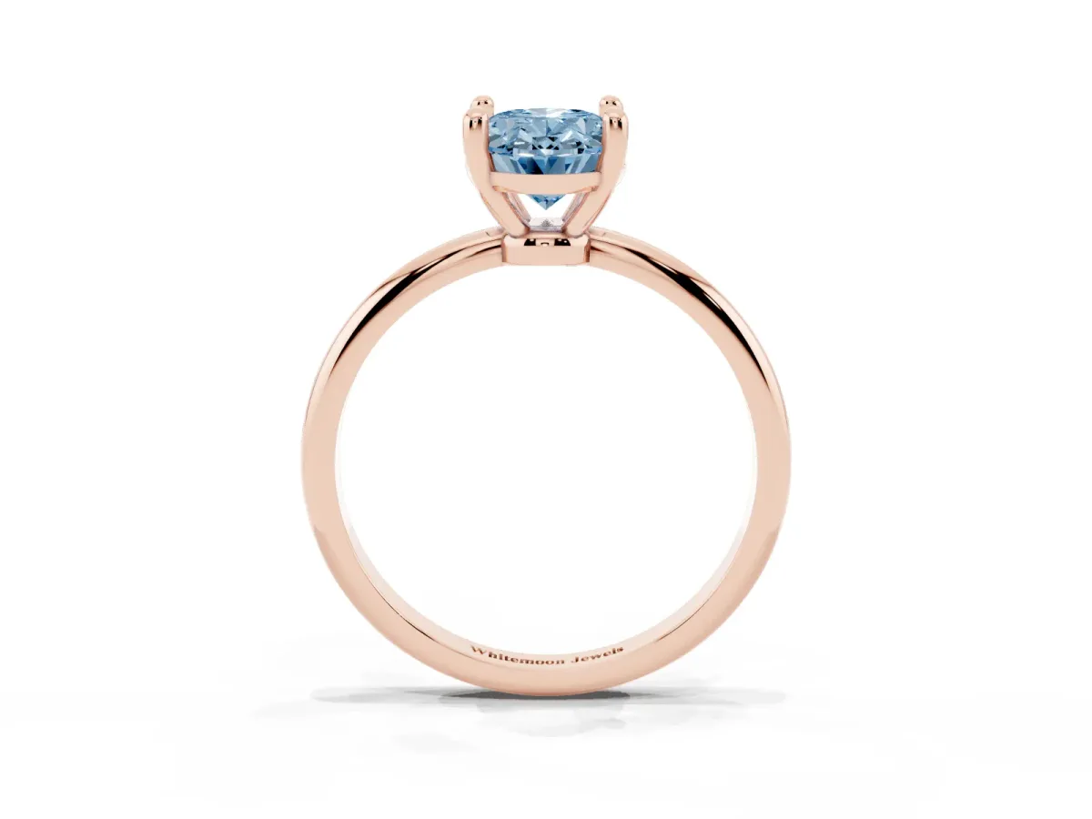 Fancy Blue Oval Cut Solitaire Diamond Ring with 4-Prong Setting on a Classic Band Rose gold