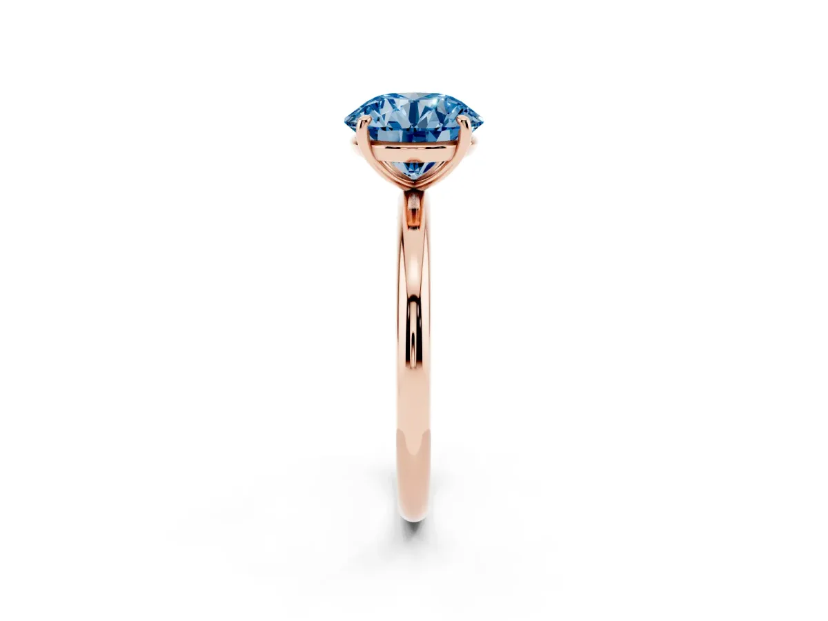 Fancy Blue Round Cut Solitaire Diamond Ring with Four-Prong Setting on a Plain Band Rose gold