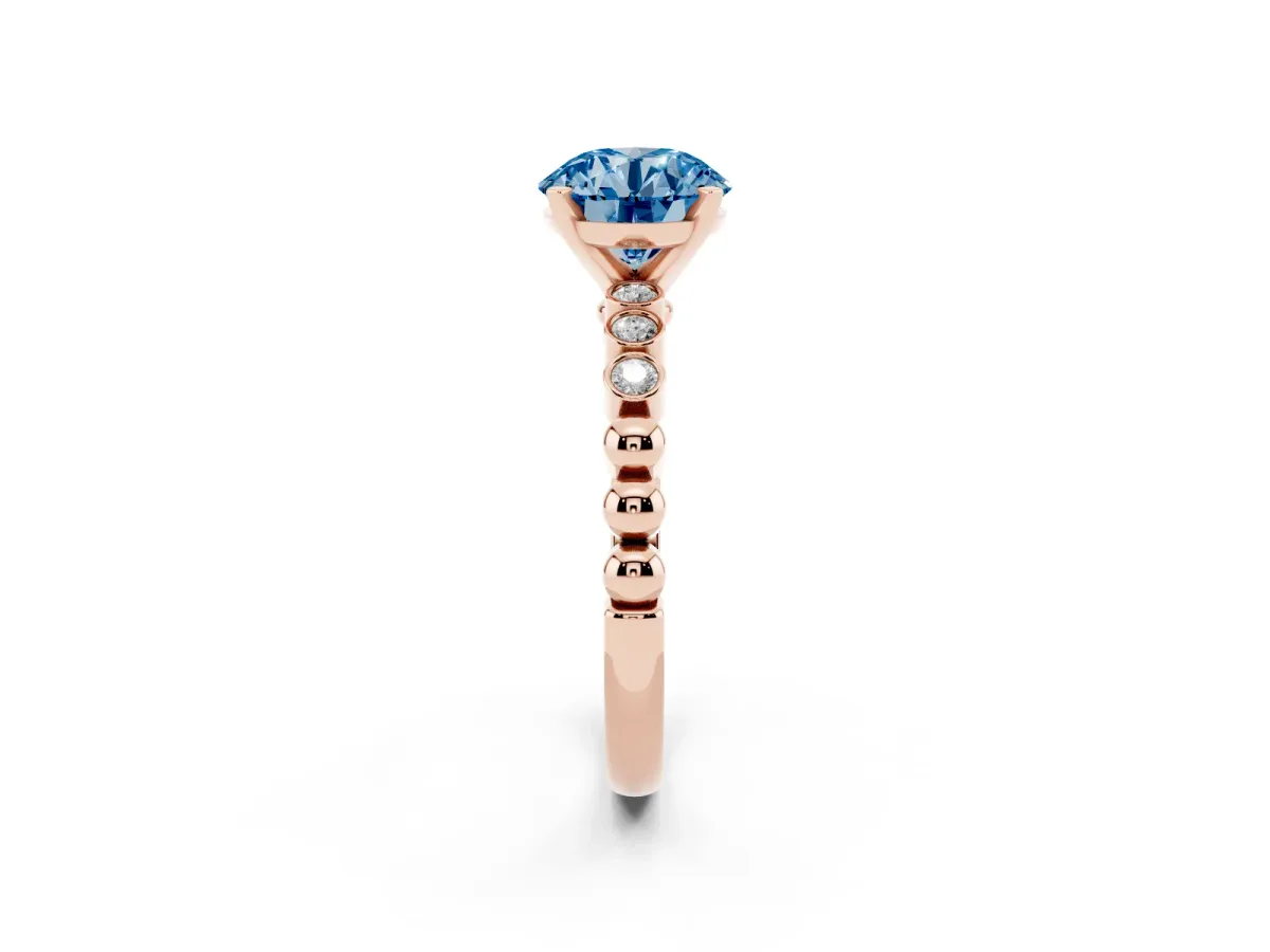 Fancy Blue Round Cut Solitaire Bezel Accent Diamond Engagement Ring with Beaded Band and Four-Prong Setting Rose gold