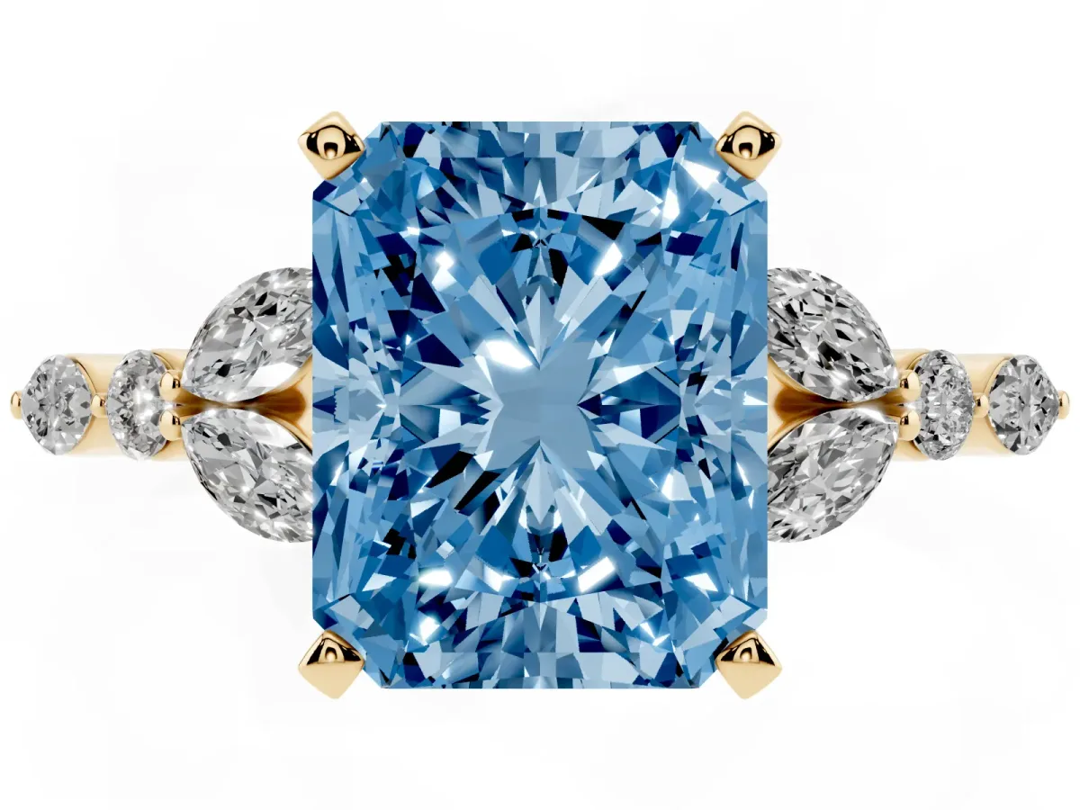 Fancy Blue Radiant Cut Diamond Solitaire Ring with Side Stones and Four-Prong Setting Yellow gold