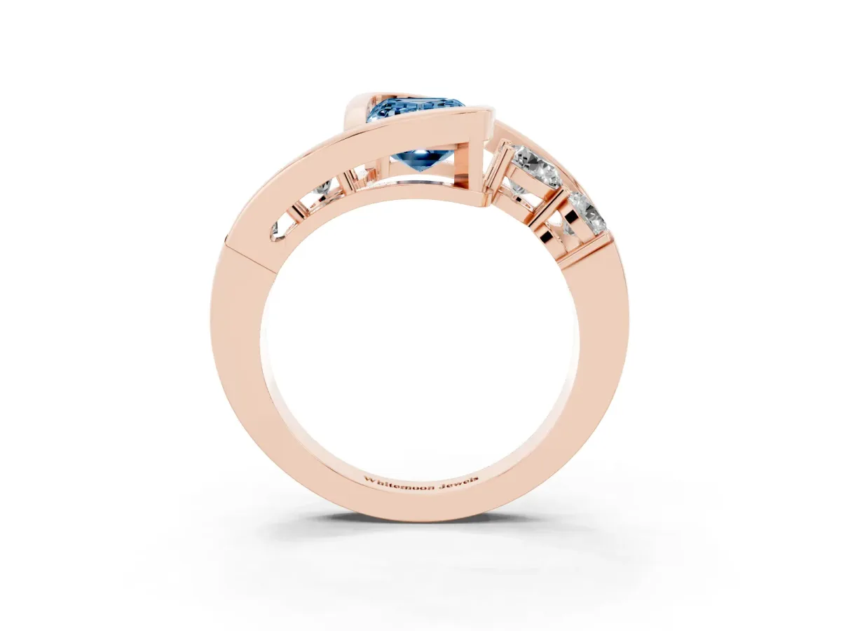 Fancy Blue Bezel Set Emerald Cut Diamond Bypass Ring with Round Accents Rose gold