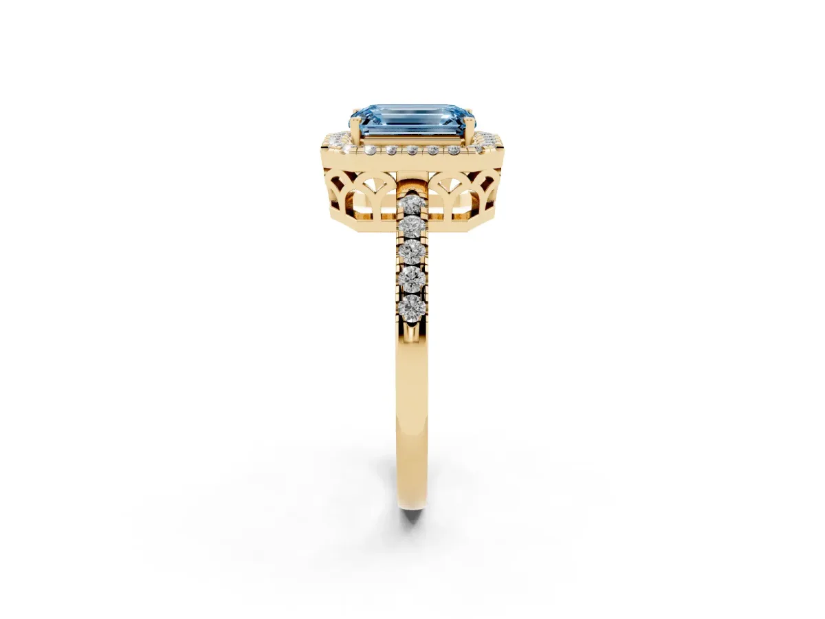 Fancy Blue Emerald Cut Halo Diamond Engagement Ring with Pavé Band and Four-Prong Setting Yellow gold