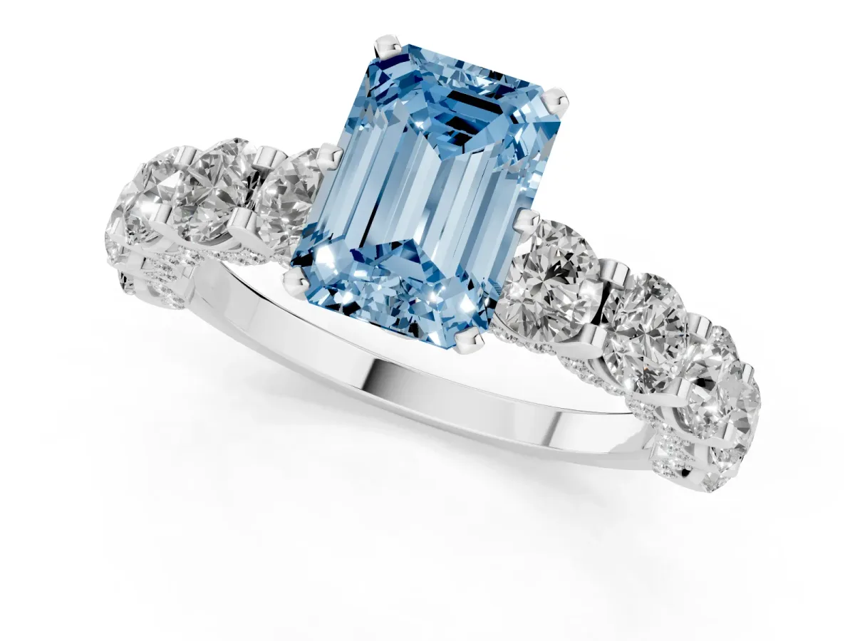 Fancy Blue Emerald Cut Diamond Side Stone Engagement Ring with Four-Prong Setting Silver