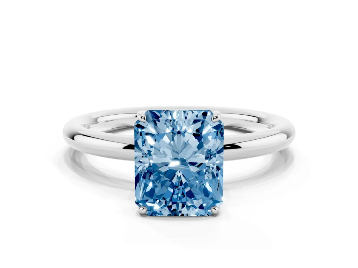 Fancy Blue Radiant Cut Solitaire Diamond Ring with Four-Prong Setting on a Plain Band White gold