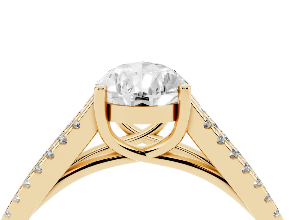 Pear Cut Diamond Solitaire Engagement Ring with Split Shank Pavé Band Yellow gold