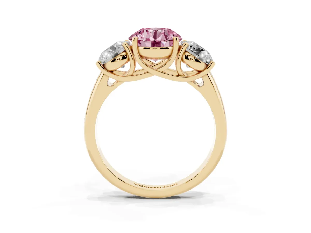 Fancy Pink Three-Stone Round Cut Diamond Engagement Ring with Prong Setting Yellow gold