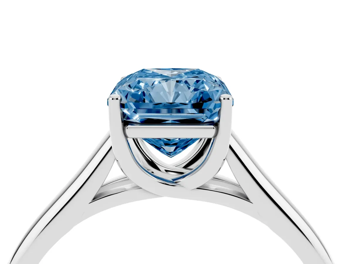 Fancy Blue Radiant Cut Solitaire Engagement Ring with Tapered Band and Four-Prong Setting Platinum
