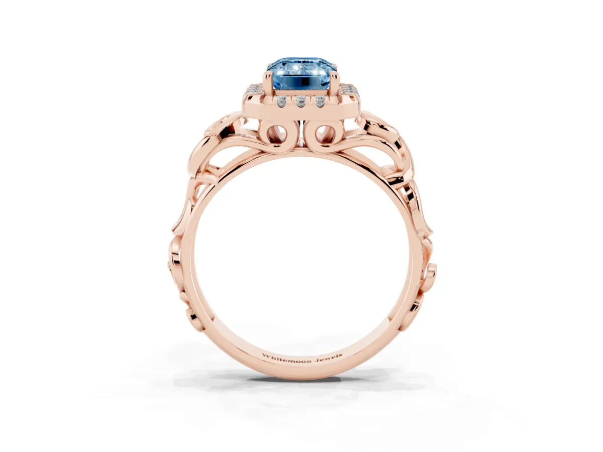 Fancy Blue Emerald Cut Cut Halo Diamond Ring with Scrollwork Band and Four-Prong Setting Rose gold
