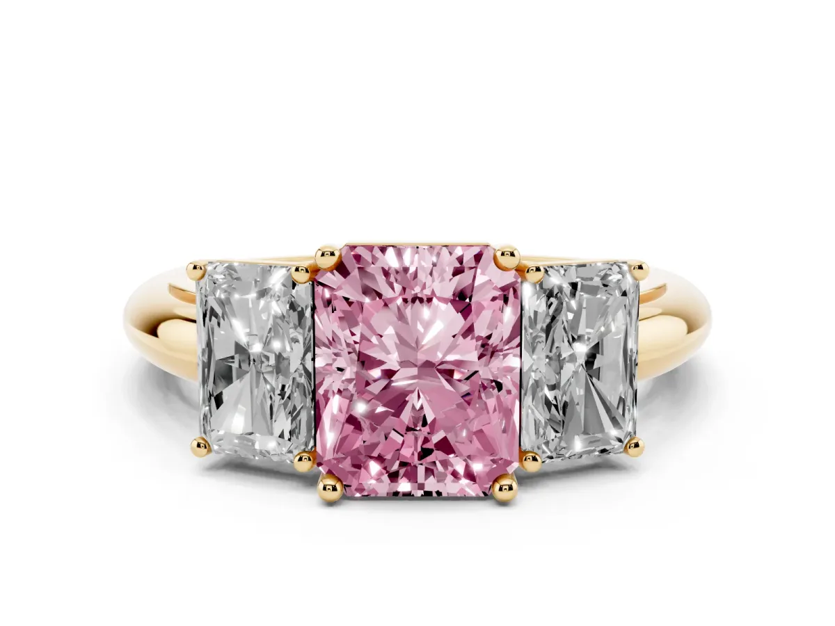 Fancy Pink Three-Stone Radiant Cut Cut Diamond Engagement Ring with Prong Setting on a White Gold Band Yellow gold