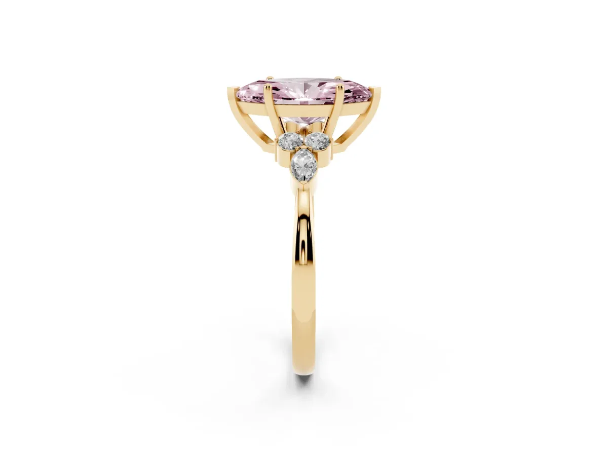 Fancy Pink Marquise Cut Brilliant Diamond Solitaire Ring with Pear Side Stones and Four-Prong Setting Yellow gold