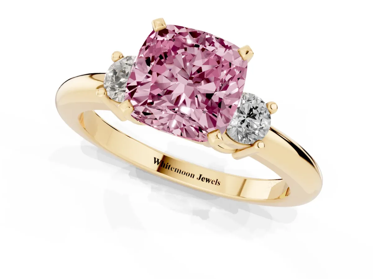 Fancy Pink Three-Stone Cushion Cut Cut Diamond Solitaire with Prong Setting and Classic Band Yellow gold