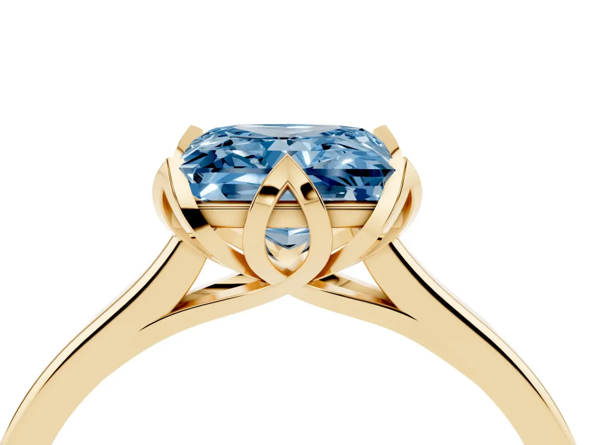 Fancy Blue Princess Cut Diamond Solitaire Ring with Flower Prong Setting and Classic Band Yellow gold