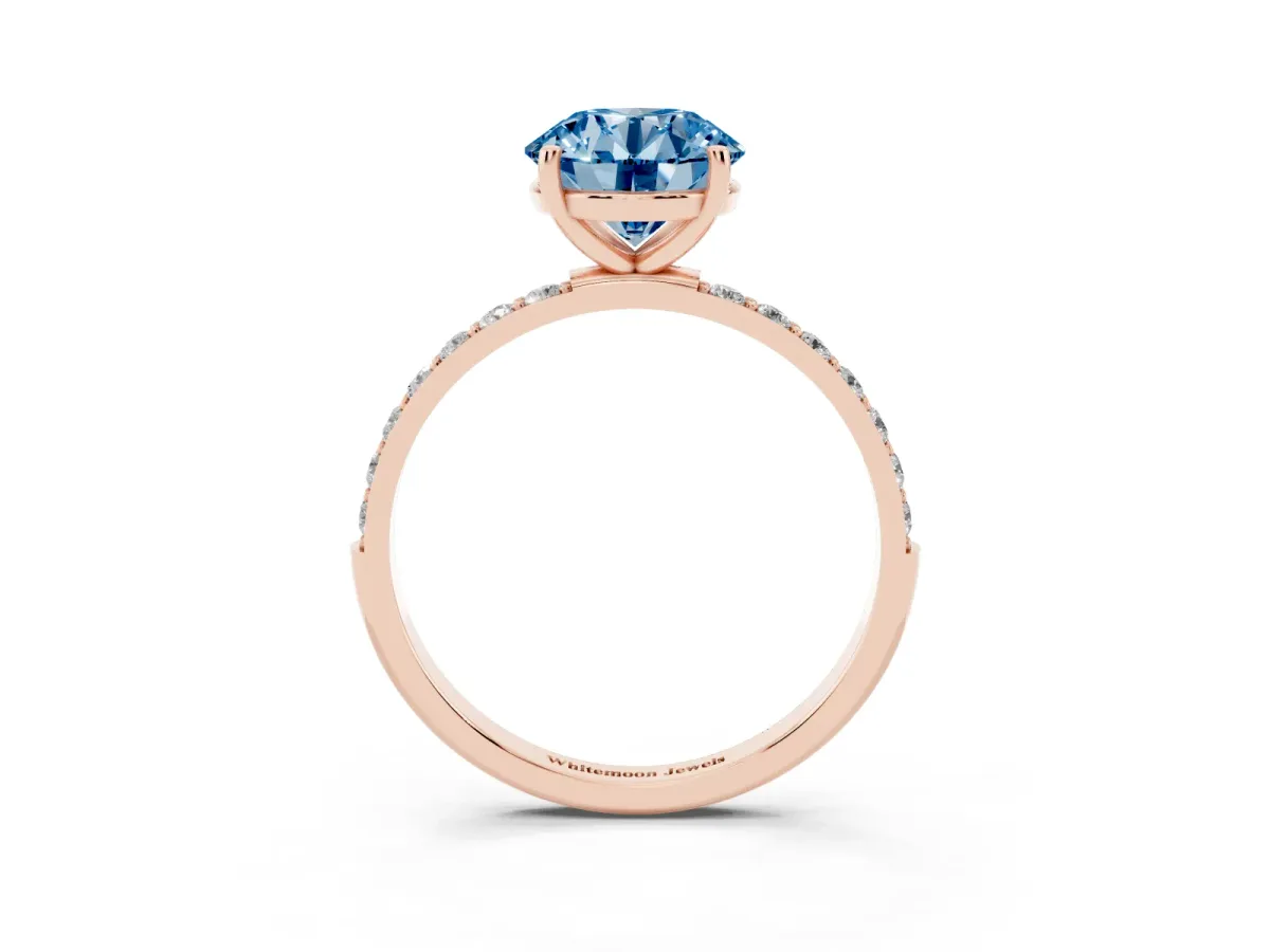 Fancy Blue Round Cut Diamond Solitaire Ring with Round Pavé Shoulders and Prong Setting Rose gold