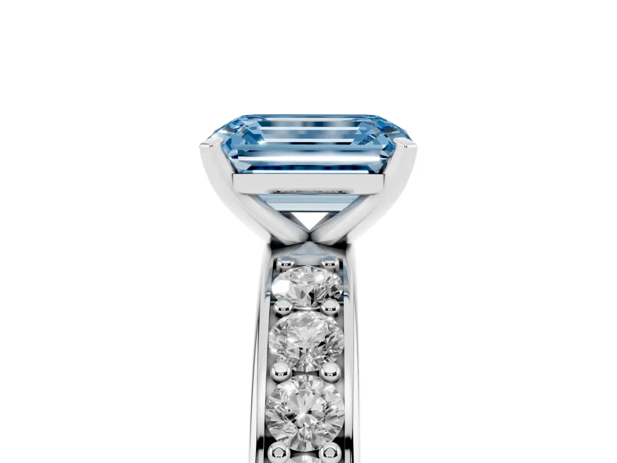 Fancy Blue Emerald Cut Diamond Engagement Ring with Channel Set Round Band and Prong Setting Silver