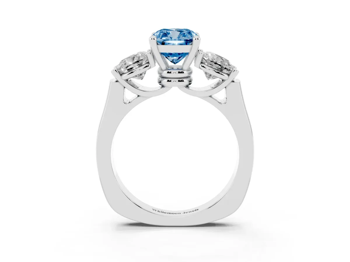 Fancy Blue Three-Stone Cushion Cut Brilliant Diamond Trellis Ring with Comfort Fit Band Platinum