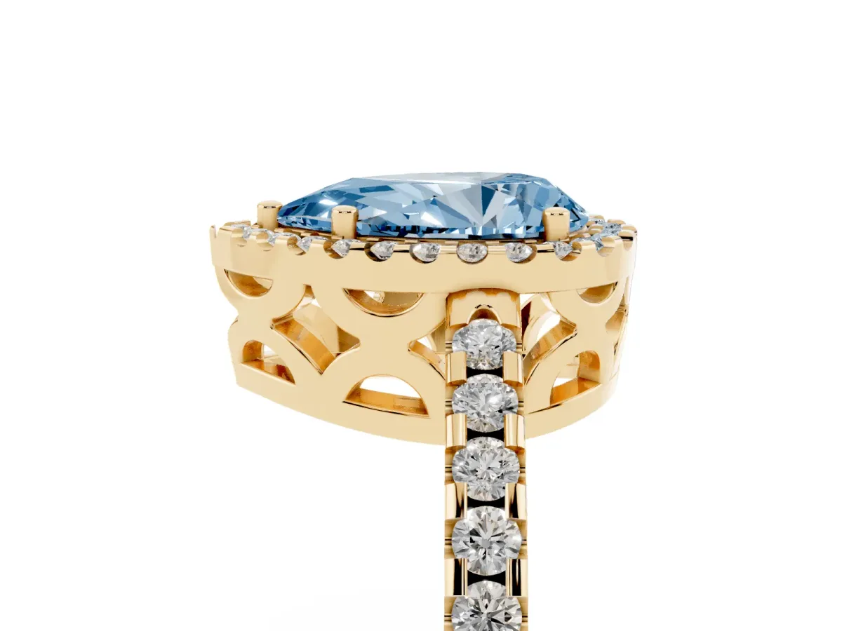 Fancy Blue Pear Cut Diamond Halo Engagement Ring with Pavé Band and Prong Setting Yellow gold