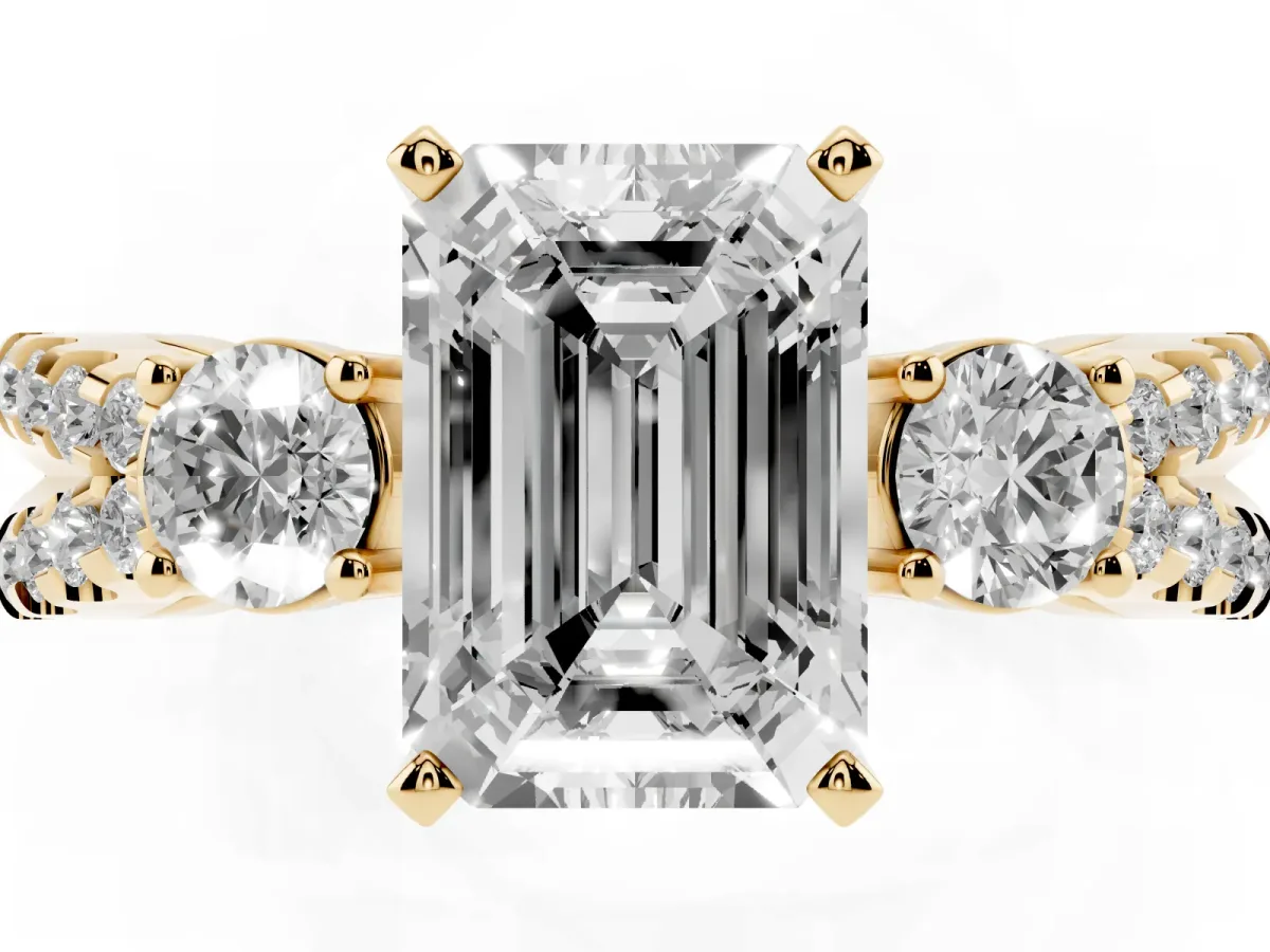 Emerald Cut Diamond Three-Stone Ring with Pavé Split Shank and Four-Prong Setting Yellow gold
