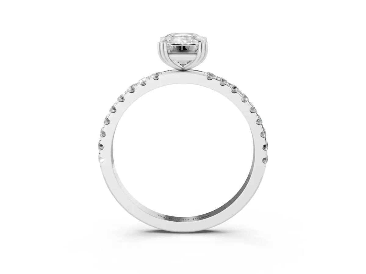 Emerald Cut Brilliant Solitaire with Pavé Band and Claw Prong Setting Silver