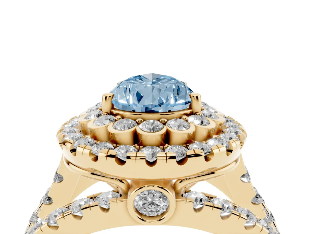 Fancy Blue Pear Cut Diamond Double Halo Ring with Round Pavé Split Shank and Prong Setting Yellow gold