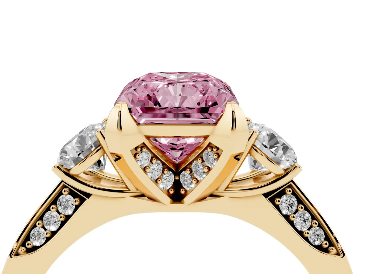 Fancy Pink Radiant Cut Brilliant Three-Stone Diamond Ring with Pavé Band and Four-Prong Setting Yellow gold