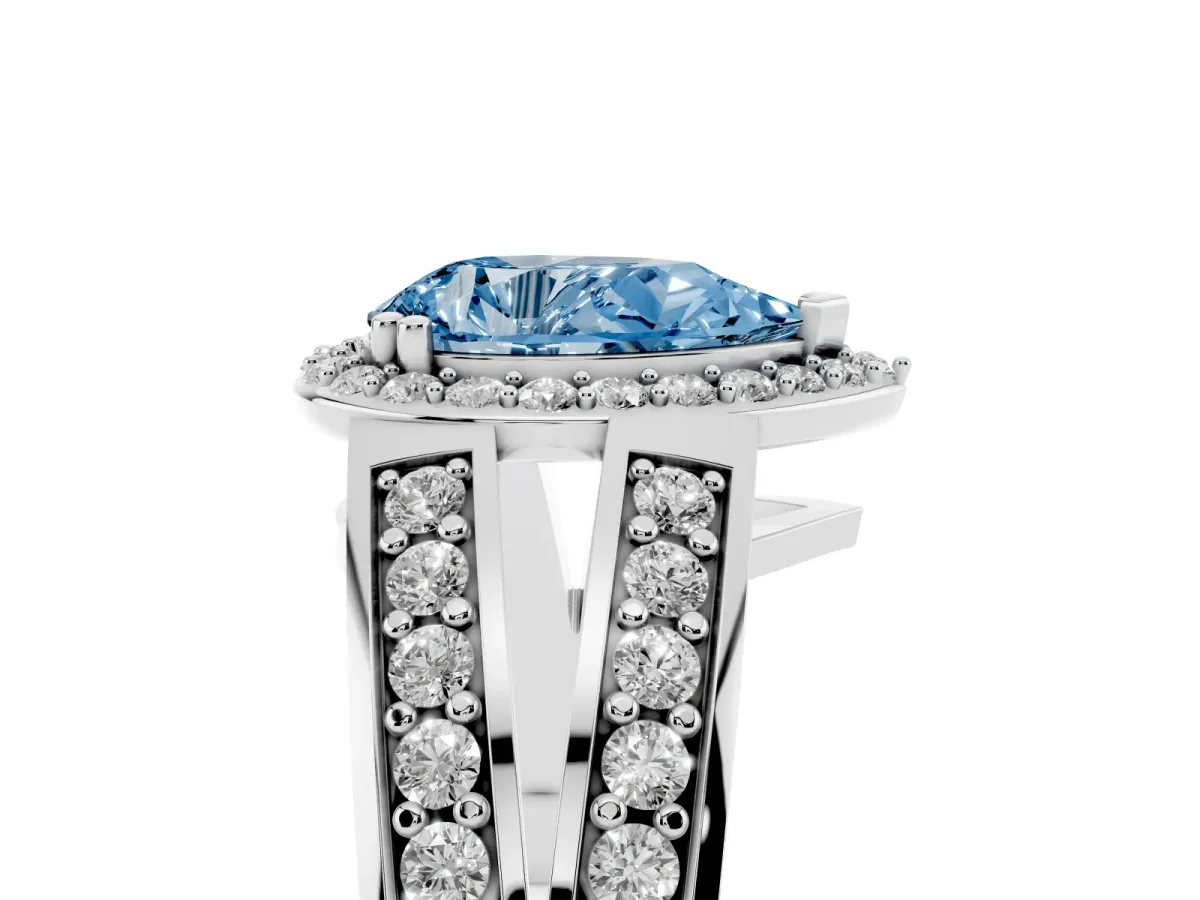 Fancy Blue Pear Cut Diamond Halo Ring with Split Shank Pavé Band and Four-Prong Setting White gold