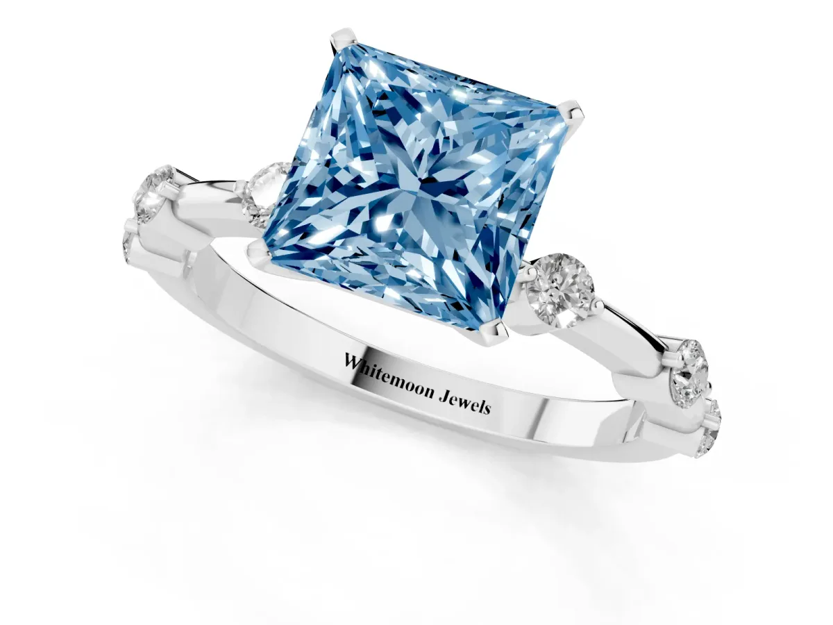 Fancy Blue Princess Cut Solitaire Diamond Ring with Bezel Set Side Stones and Prong Setting Platinum