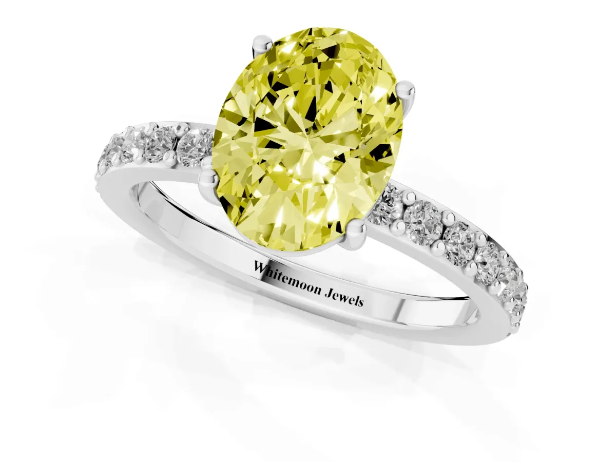 Fancy Yellow Oval Cut Cut Diamond Solitaire with Pave Band and Four-Prong Setting Silver
