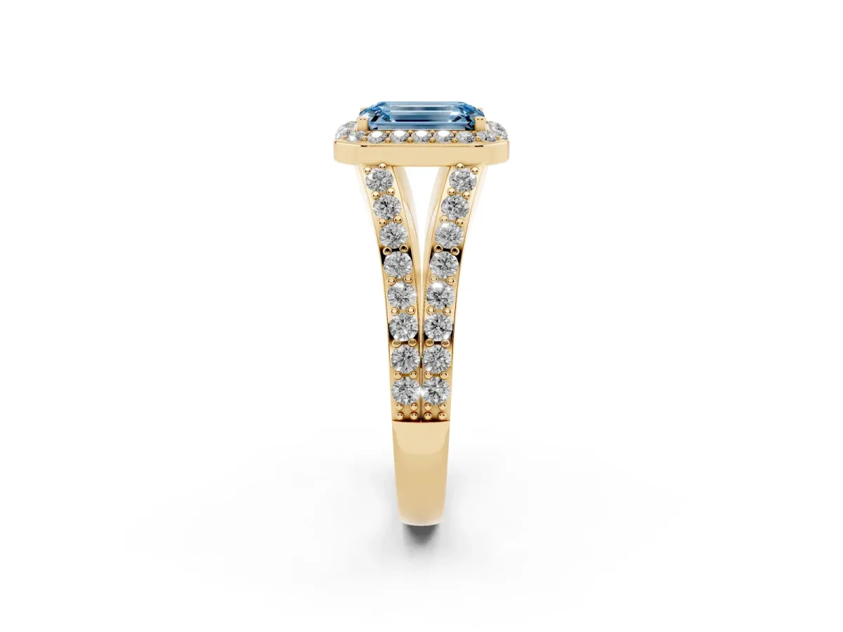 Fancy Blue Emerald Cut Diamond Split Shank Halo Ring with Four-Prong Setting Yellow gold