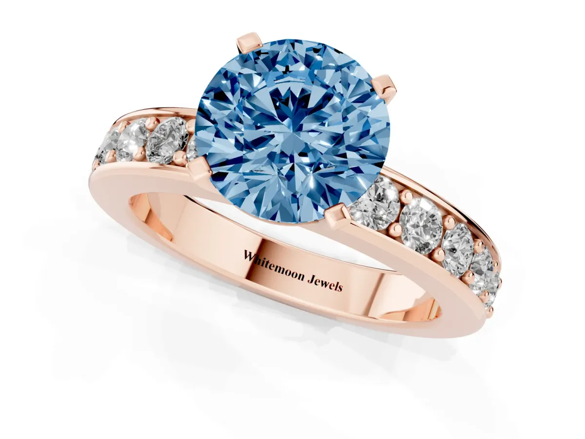 Fancy Blue Round Cut Diamond Engagement Ring with Channel Set Round Band and Prong Setting Rose gold