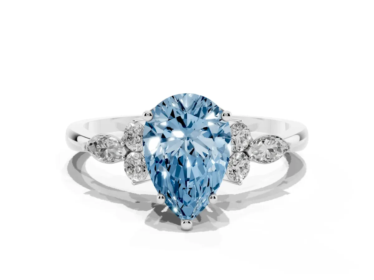 Fancy Blue Pear Cut Brilliant Diamond Solitaire Ring with Pear Side Stones and Four-Prong Setting Silver