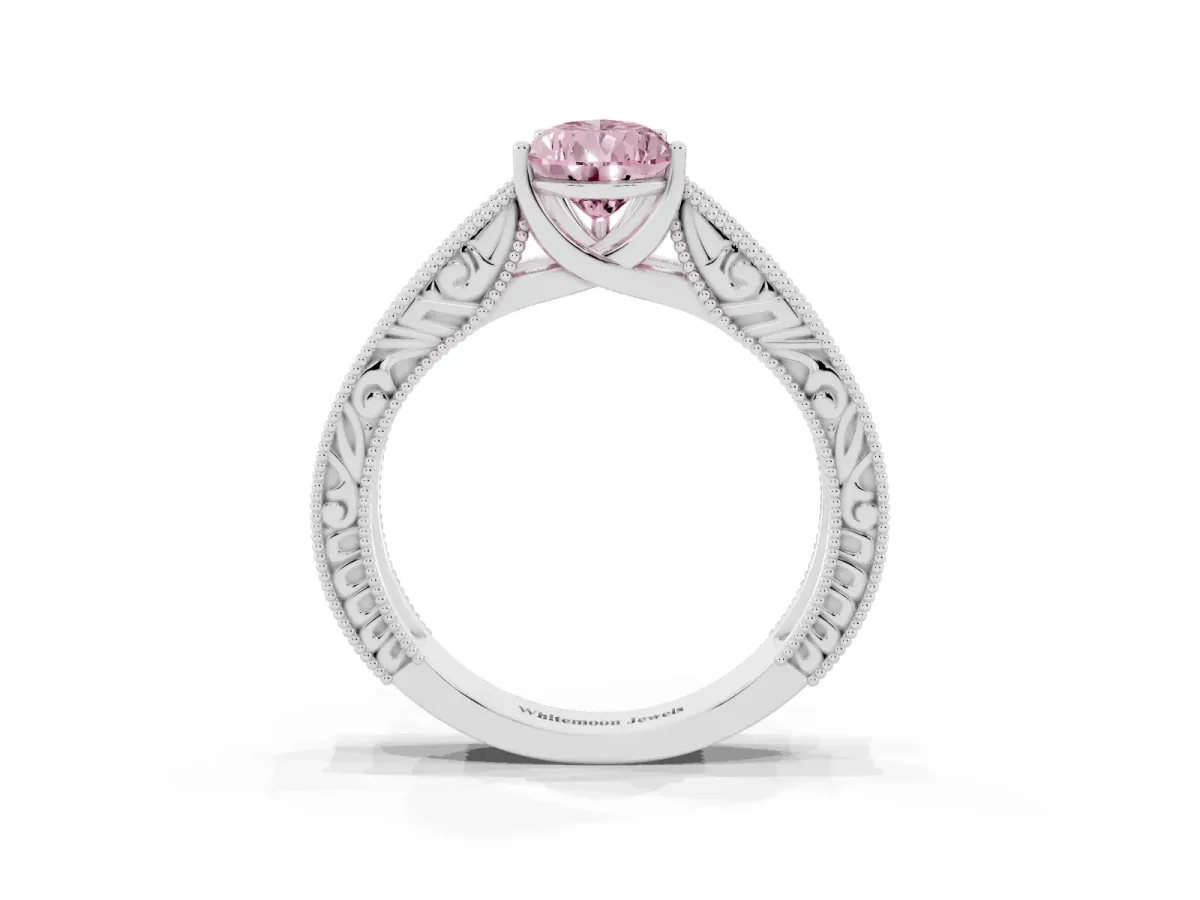 Fancy Pink Pear Cut Diamond Solitaire Ring with Engraved Band and Four-Prong Setting Silver