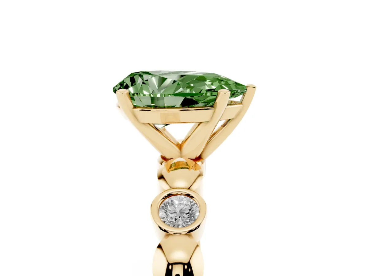 Fancy Green Pear Cut Solitaire Bezel-Set Diamond Ring with Beaded Band and Four-Prong Setting Yellow gold